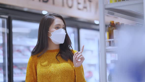 shopping in covid spread,asian female adult woman wearing face mask protection