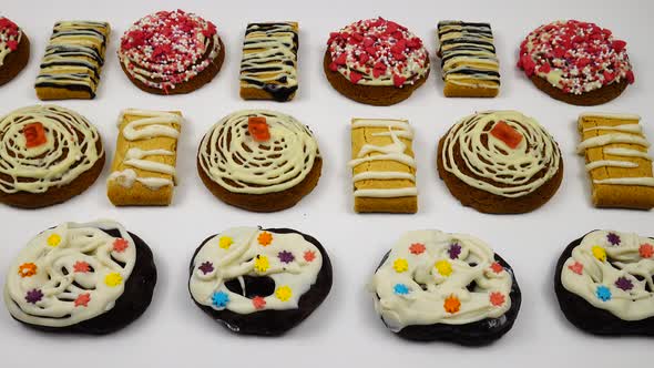 Shortbread of the different shapes and of a various decorated are on a white background alt