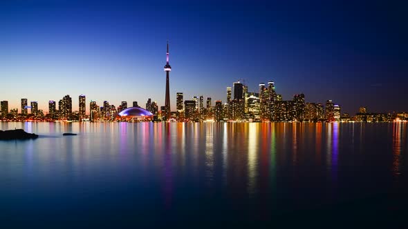 An epic view of a day to night timelapse of Toronto city