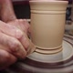 Professional Potter Has Formed Clay Jug with Special Scraper on Potter&#39;s Wheel and Removes His Hands - VideoHive Item for Sale