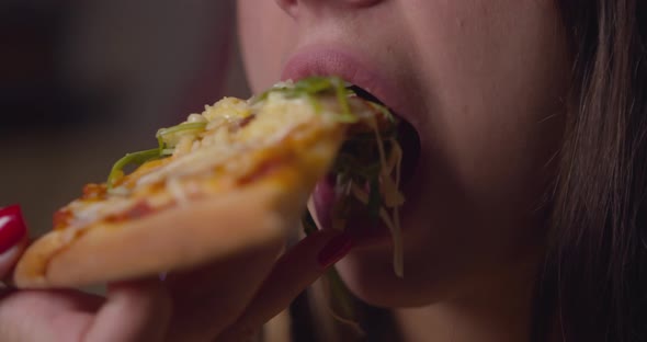 Close Up of Young Woman Eating Traditional Mozzarella Pizza in Cafe