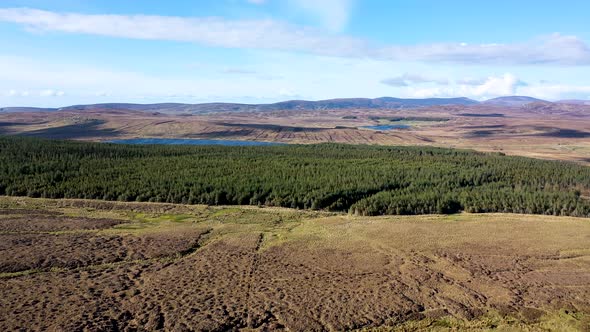 Flying From Slieve League Towards Lough Auva in County Donegal  Ireland alt
