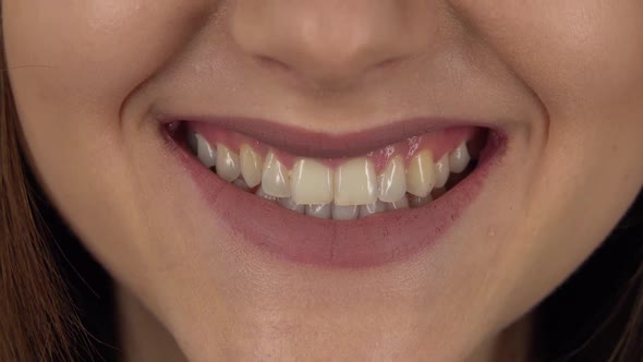 Woman Smiling Teeth, Isolated on Green Screen. Close Up alt