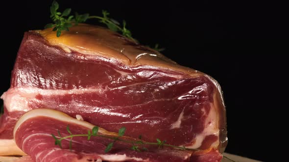 large piece of prosciutto and chopped pieces rotate  alt