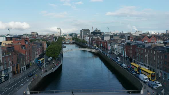Rising Shot of Liffey River in Stone Paved River Bed in Town and Bridges Connecting Waterfronts alt
