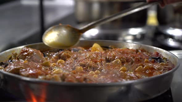 Meat and Juicy Meals Cooked in a Pan 4K alt