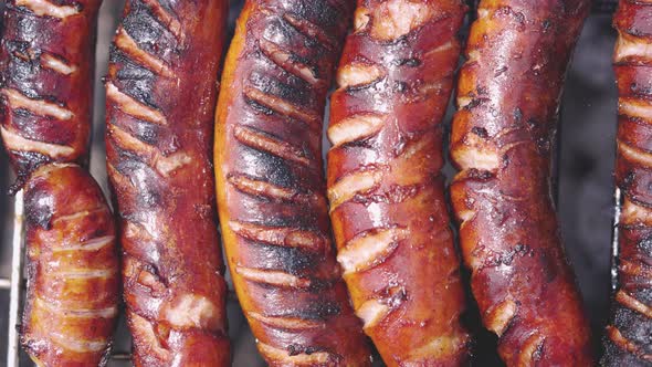 Tasty Hot Sausages on Grill alt