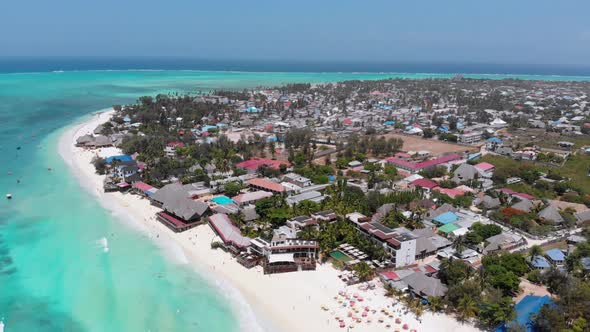 Aerial Paradise Island Sandy Beach Turquoise Ocean and Luxury Hotels Zanzibar alt