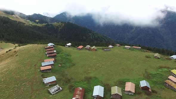 Highland Houses in the Meadow Above Top of the Hill  alt