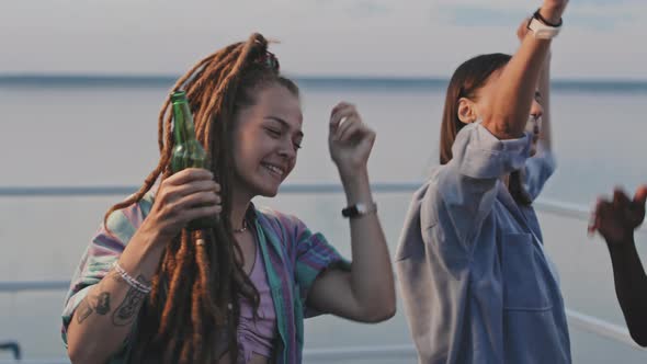 Young Friends Partying in Nature alt
