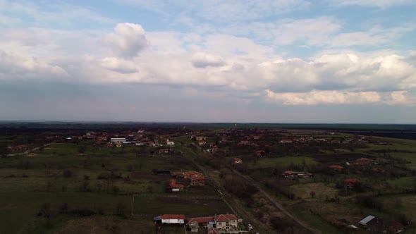 Clouds over a village alt