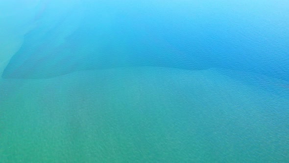 4K aerial drone view of beautiful sea waves, Flight over sea. alt