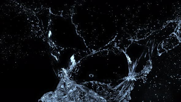 Super Slow Motion Shot of Water Splash at 1000Fps Isolated on Black Background alt