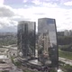 Mirrored two Building and Clouds with cars and river drone 4k - VideoHive Item for Sale