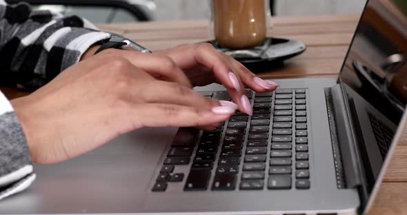 Woman professional user worker using typing on laptop.
