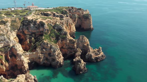 Stunning scarps surrounding Ponta da Piedade lighthouse, Lagos Algarve, Portugal alt