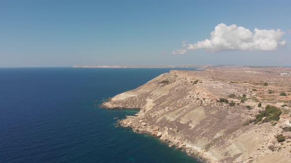 Aerial drone video from western Malta, Mgarr area, Fomm ir-Rih bay. alt