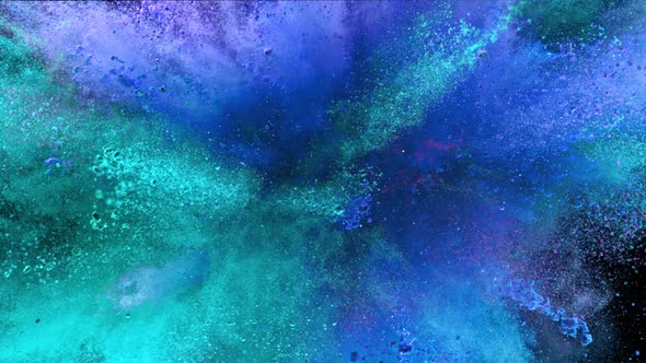 Super Slowmotion Shot of Color Powder Explosion Isolated on Black Background alt