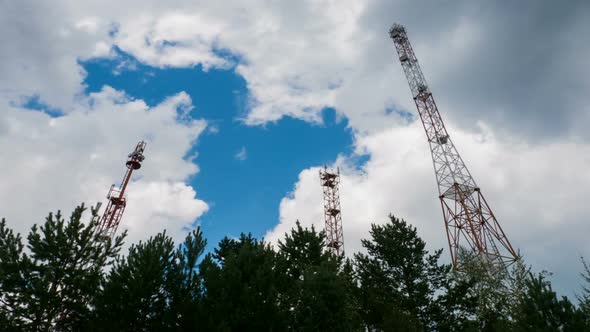 Cumulus Clouds Over 3 Cell Towers Time Lapse