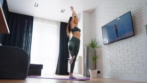 Yoga Woman Balancing on One Leg alt