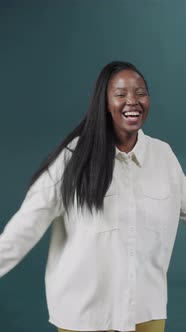 Woman Removing Protective Face Mask and Throwing It Away During COVID19 Pandemic alt
