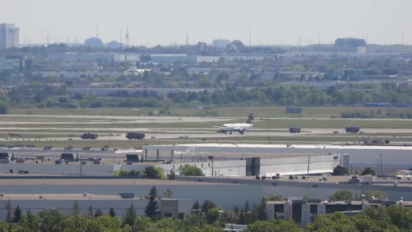 Airplane taxis, drives to runway before takeoff, heat shimmers over airport alt