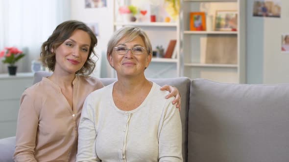 Adorable Girl Holding Tulips, Congratulating Parents on 8 March, Surprising Gift alt