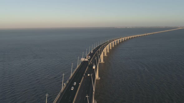 Aerial Drone video of Ponte Vasco da Gama Bridge with cars passing