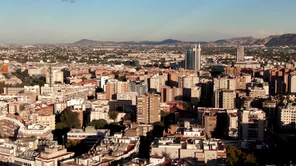 Aerial shot flying over the popular tourist city of Murcia in Spain alt