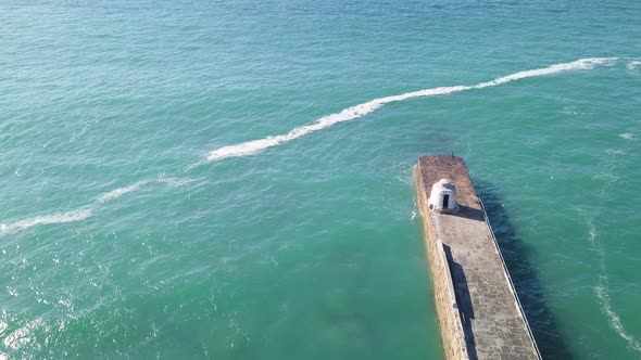 Aerial View Of The Monkey Hut, A Historical Landmark At The Celtic Sea In Portreath, Cornwall alt