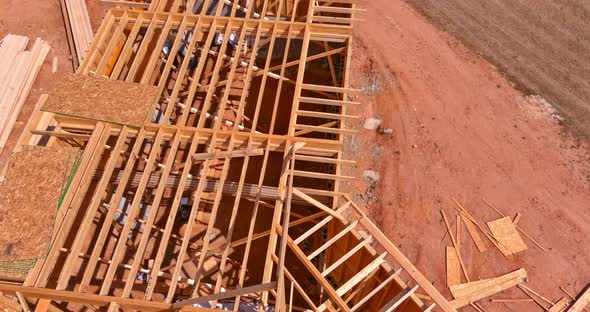 Closeup New Stick Built Home Under Construction Under Framing Structure Wood Frame of House alt