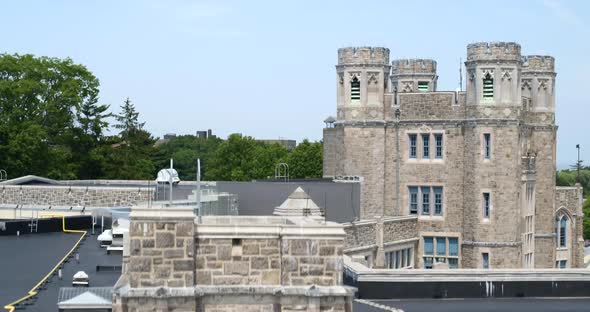 Rising Aerial View from a Gothic Style School Campus Building in New Rochelle alt