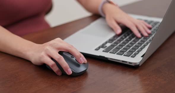 Woman work on computer at home alt