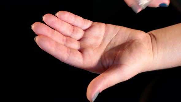 Female's Hands Take Out the Pill From the Blister alt