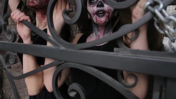 Make-up artist make the girl halloween make up in studio. alt