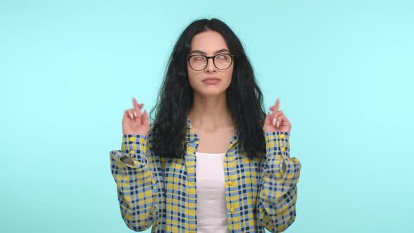 Beautiful Caucasian Woman with Long Curly Hair Wearing Glasses Looking Nervous and Breathing Heavily
