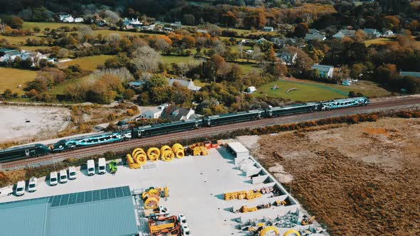 The suburban train is moving on the track Beautiful country landscape.