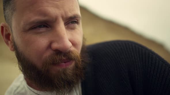 Bearded Man Looking Camera alt