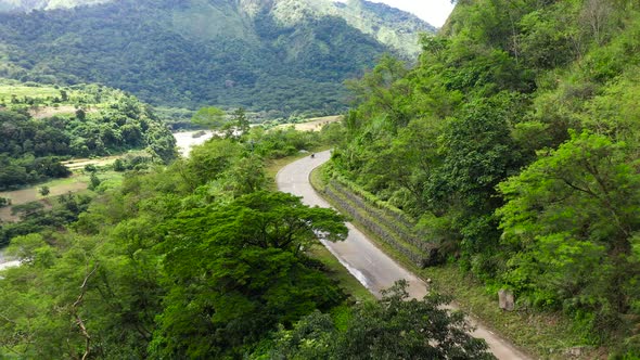 Philippines Mountain Landscape. Winding Rainforest Road in Cordillera Mountains alt