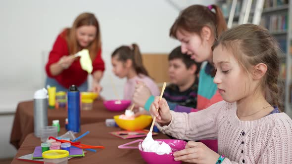 Kids with Special Needs Making Slimes in Class alt