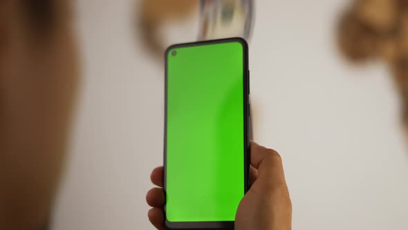 Cash is Flying Out of the Phone with Green Screen alt