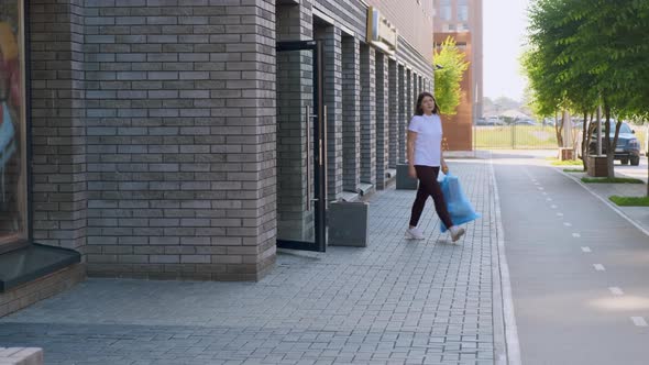 Housewife Leaves Her House with a Bag of Garbage alt