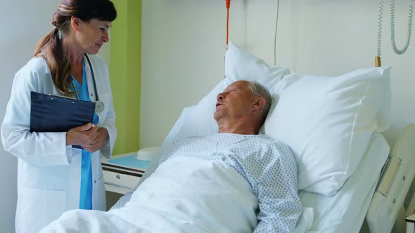 Female doctor interacting with patient alt