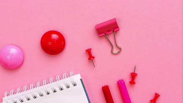 Markers of Different Pink Shades with White Notepad on Pink Background Top alt