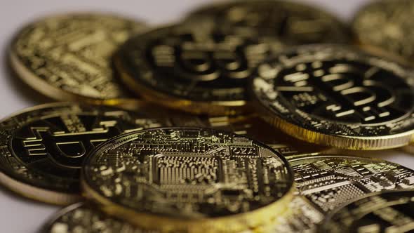 Rotating shot of Bitcoins  alt