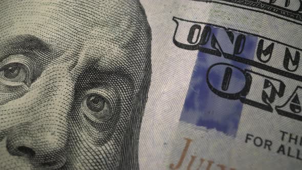 American one hundred dollar paper banknote in close up macro view dolly shot. alt