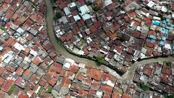 Water canal in Bandung city near Pasupati bridge, West Java Indonesia, Aerial tilt down reveal shot alt