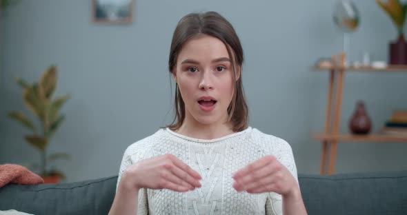 Close Up of Pretty Woman Looking To Camera and Showing with Deaf-mute Sign Language Say No To alt