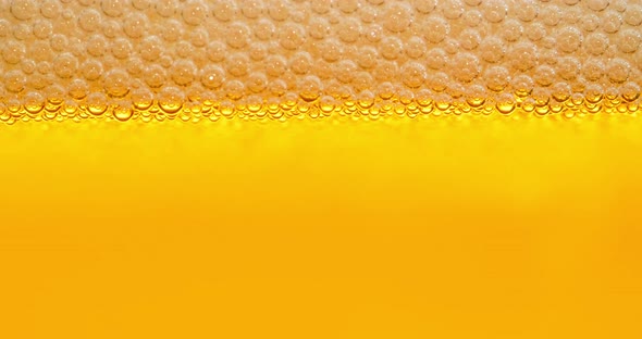 4K - Beer foam close-up. macro shot alt