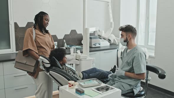 Mother Leaving Son in Dentist Office for Procedure alt